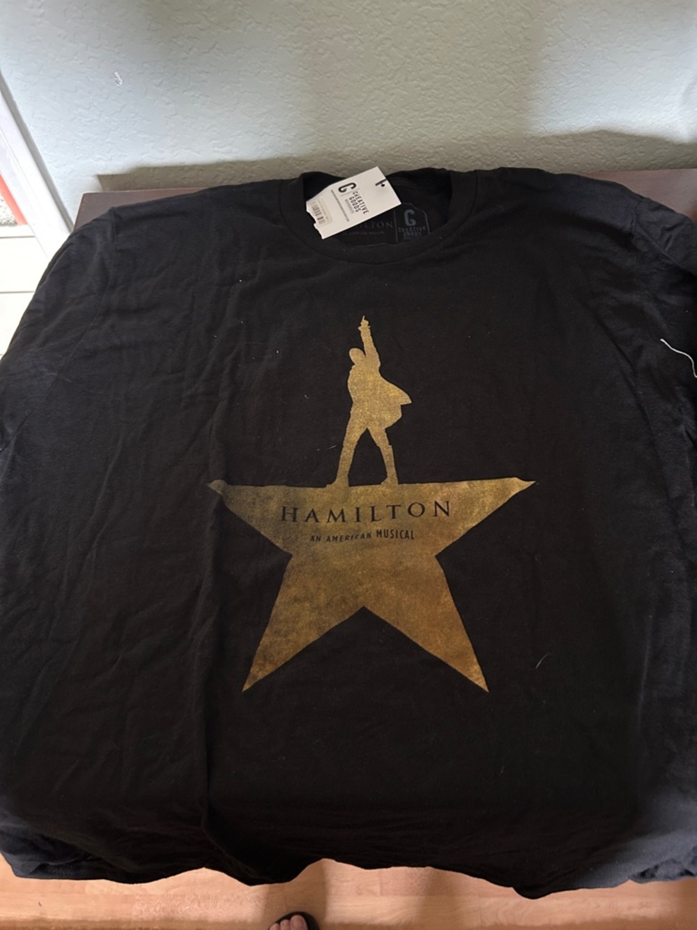 Hamilton Musical Gold Star Black Tee